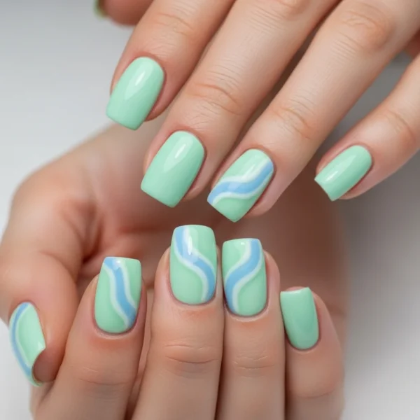 Mint Green and Baby Blue Swirl Nails