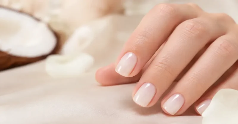 Short squoval coconut jelly nails with a glossy translucent milky white finish